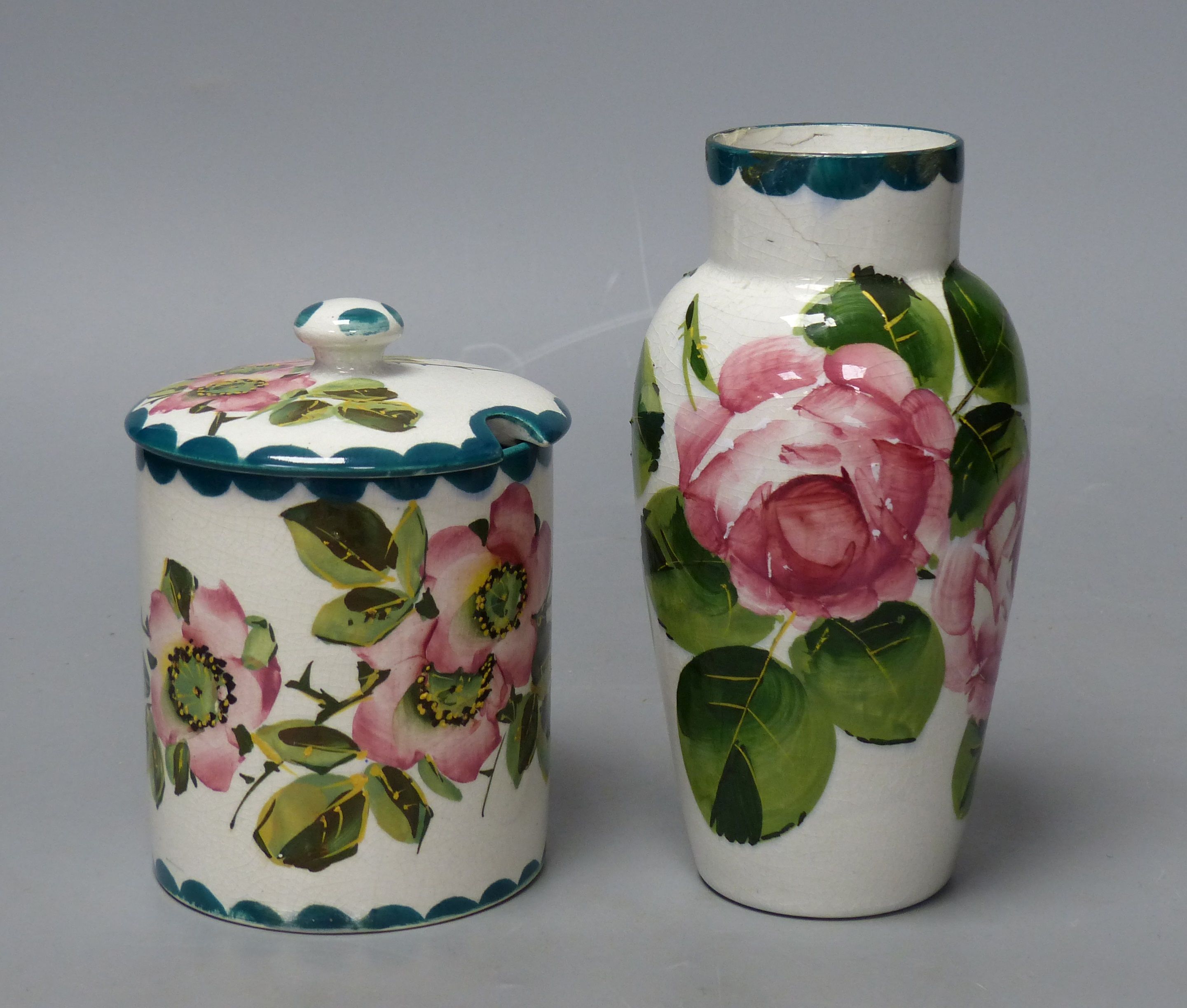 A Wemyss cabbage rose vase and a wild rose pattern lidded preserve jar, tallest 16cm
